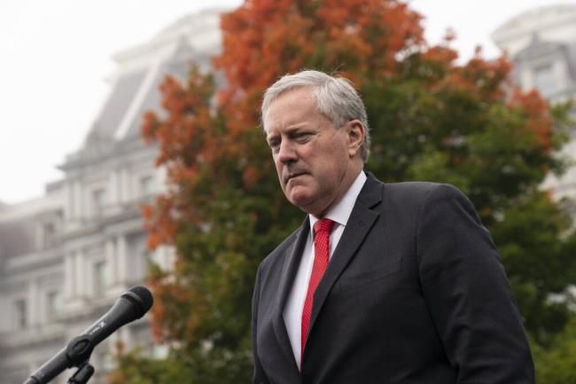 FILE - White House chief of staff Mark Meadows speaks with reporters at the White House, Wednesday, Oct. 21, 2020, in Washington. (AP Photo/Alex Brandon, File)