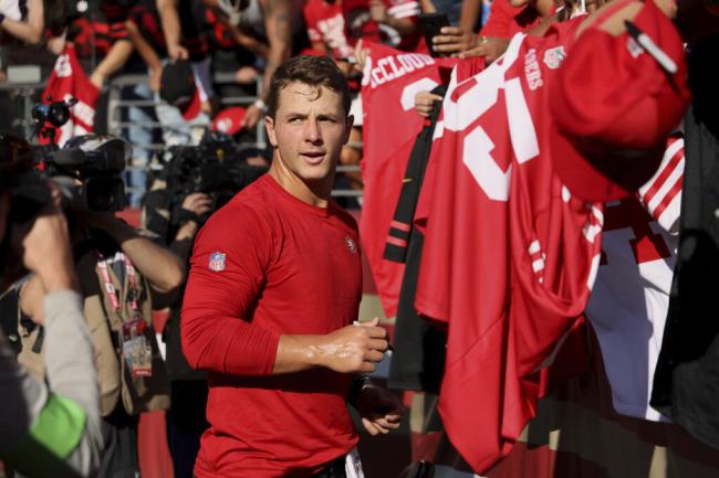 49ers quarterback Brock Purdy signs autographs before the Aug. 25 preseason game against the Los Angeles Chargers in Santa Clara. (Scot Tucker / ASSOCIATED PRESS)